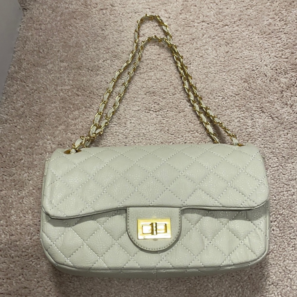 Faux leather Quilted flap bag. Used excellent